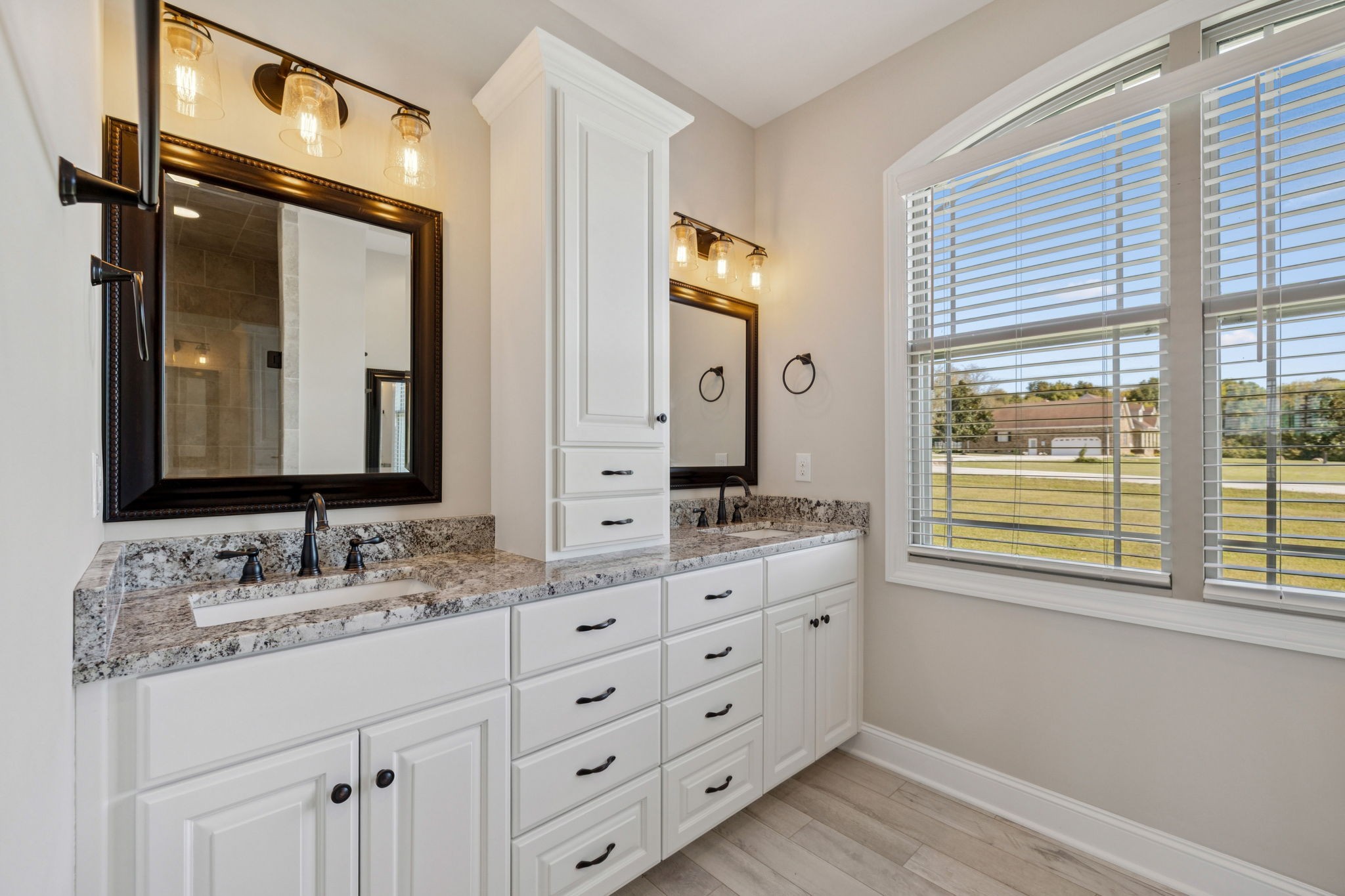 105 Barbara Spears Road Morrison, TN 37357 - Photo 25 of 55 a bathroom with a double vanity sink and a mirror