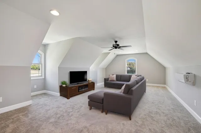 a view of a house with swimming pool and porch with furniture