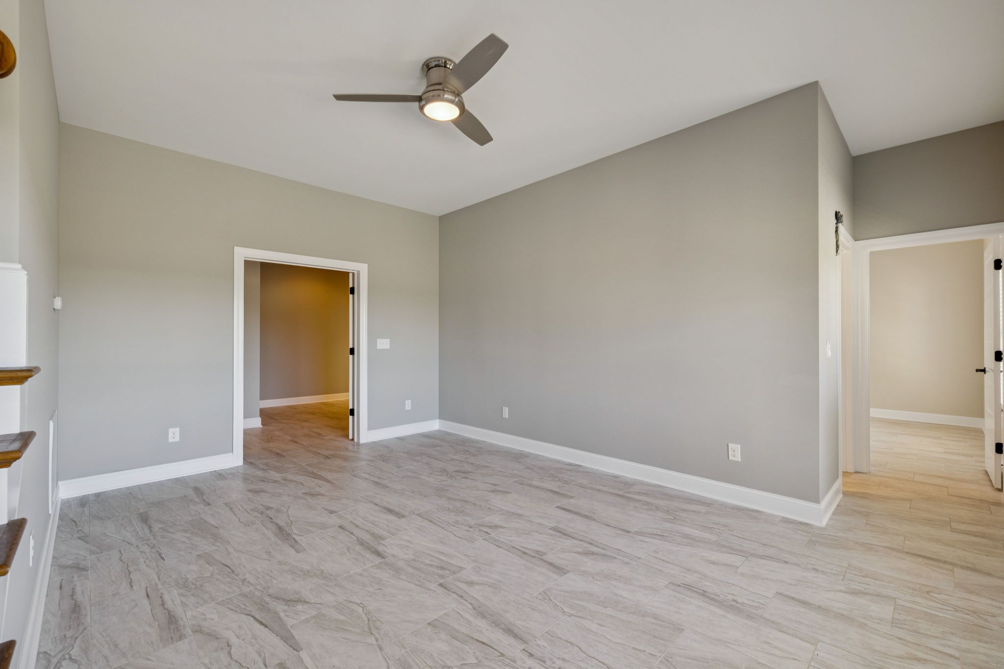 105 Barbara Spears Road Morrison, TN 37357 - Photo 31 of 55 a view of an empty room with wooden floor and a ceiling fan
