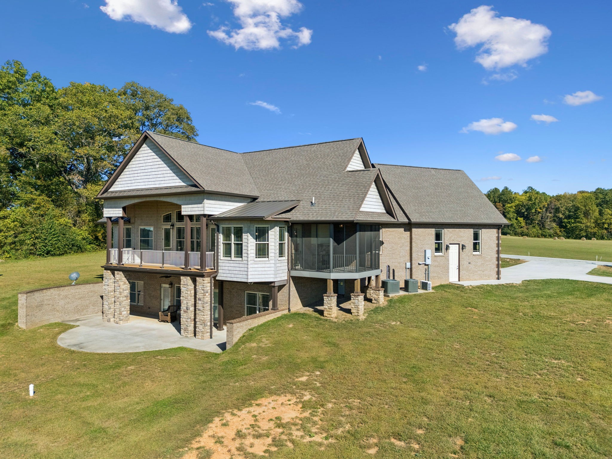 105 Barbara Spears Road Morrison, TN 37357 - Photo 50 of 55 a view of a house with pool and sitting area