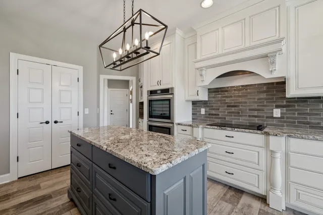a view of fireplace with wooden floor