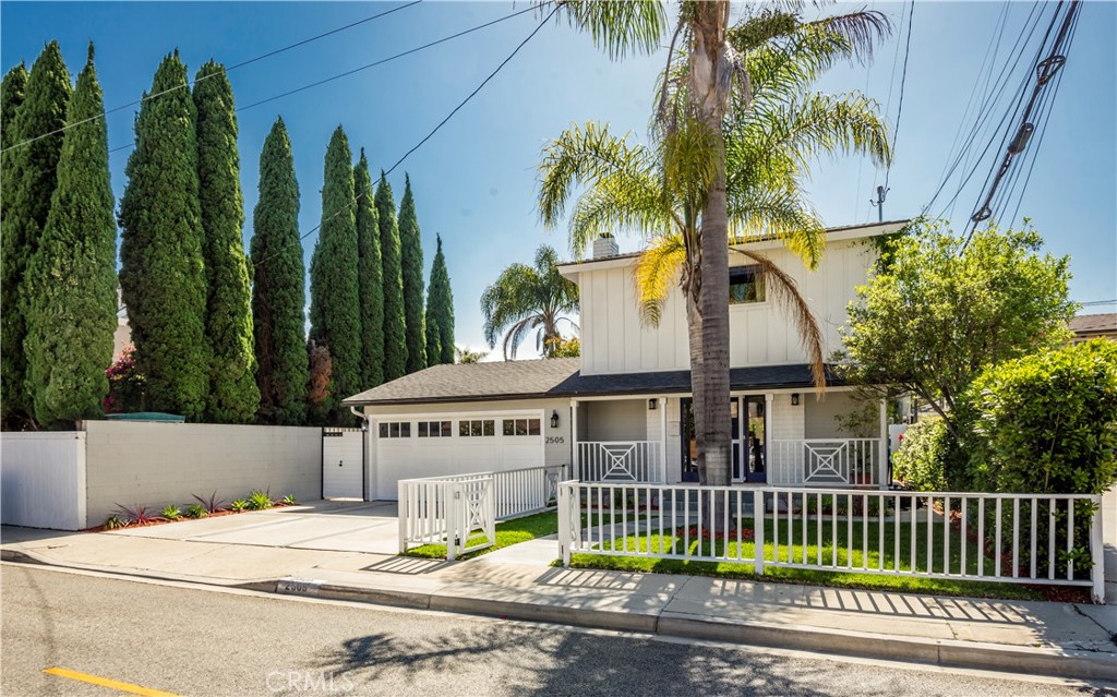 2505 Vail Avenue Redondo Beach, CA 90278 - Photo 15 of 41 a view of a house with a yard and palm trees