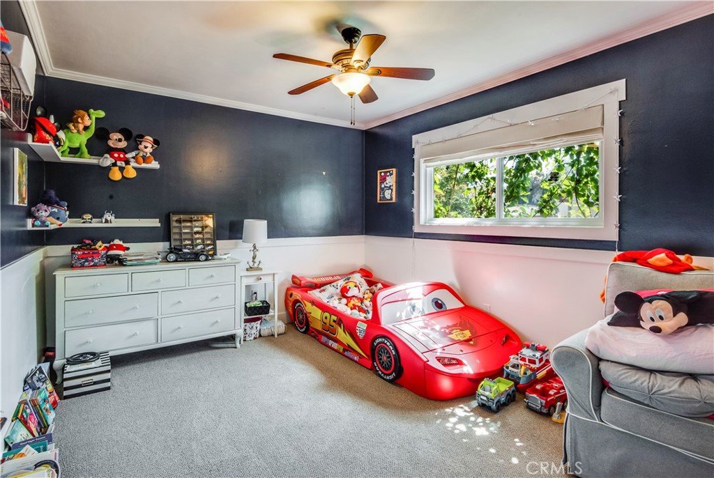 2505 Vail Avenue Redondo Beach, CA 90278 - Photo 31 of 41 a bedroom with a bed and a chandelier