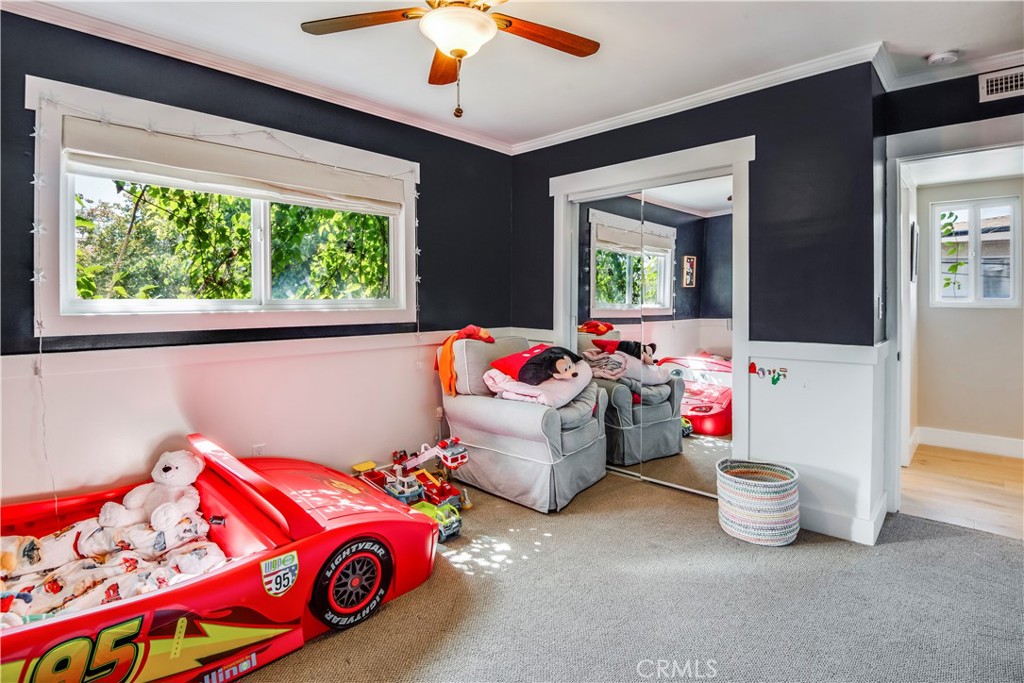 2505 Vail Avenue Redondo Beach, CA 90278 - Photo 32 of 41 a living room with furniture and a chandelier