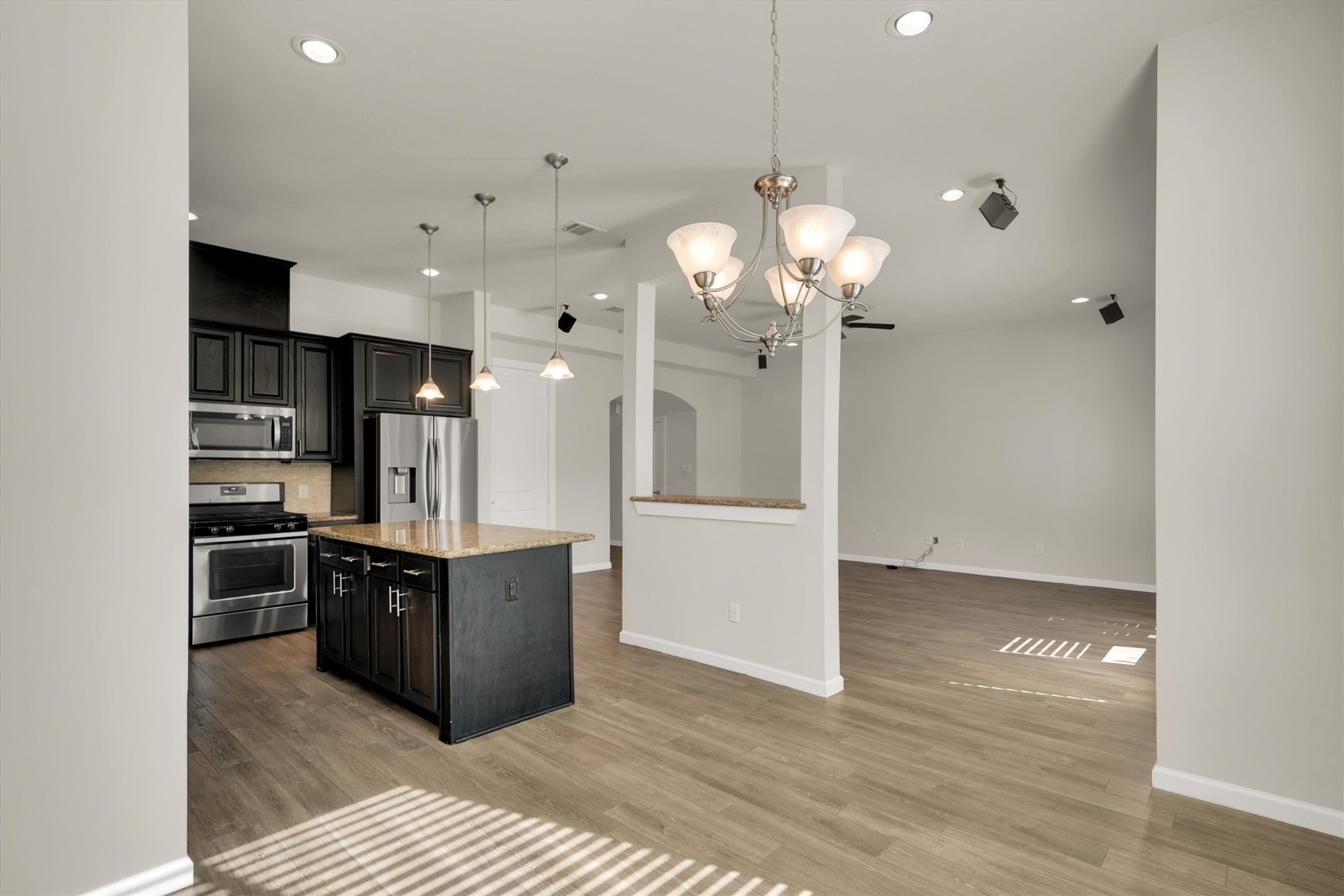 9405 Blalock Tree Court Houston, TX 77080 - Photo 12 of 39 a view of a kitchen and kitchen island