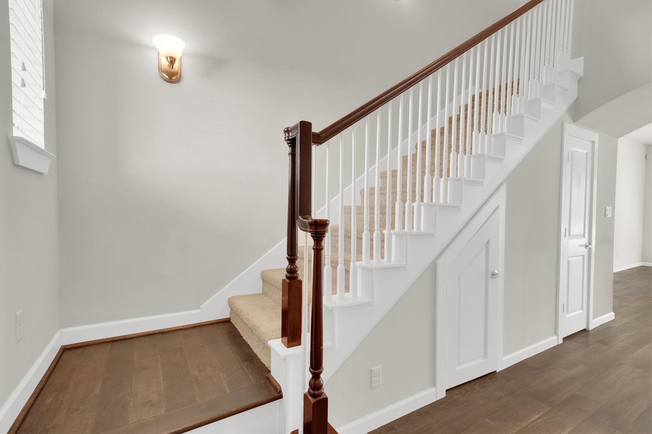 9405 Blalock Tree Court Houston, TX 77080 - Photo 17 of 39 a view of staircase with railing and white walls