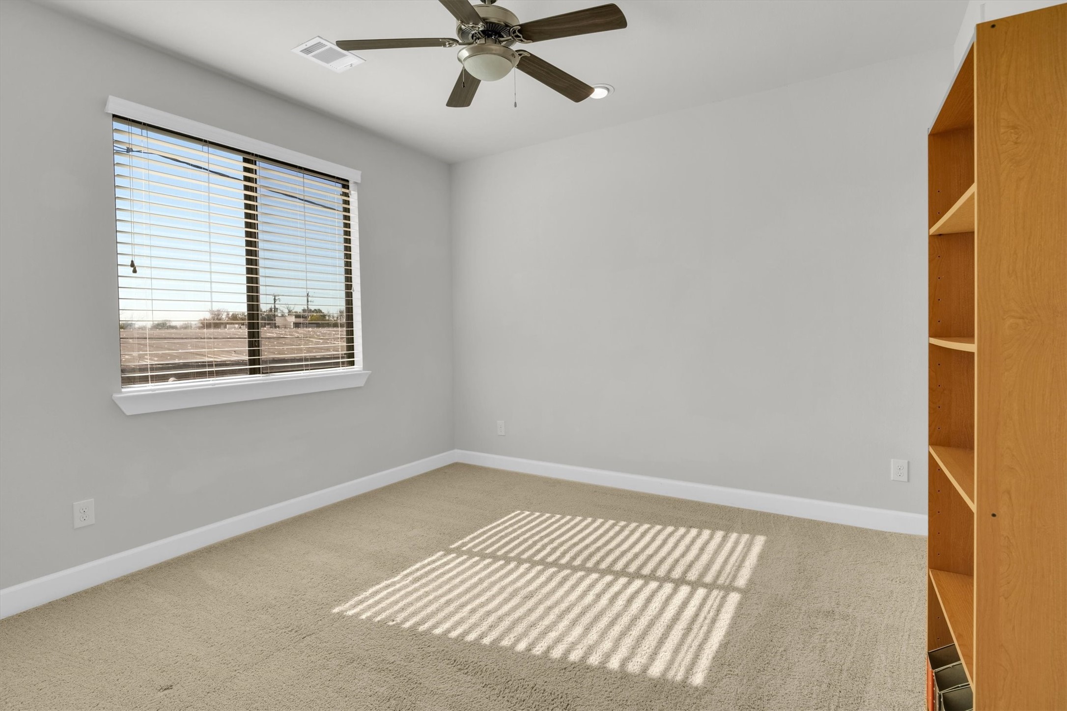 9405 Blalock Tree Court Houston, TX 77080 - Photo 33 of 39 a view of an empty room with a window