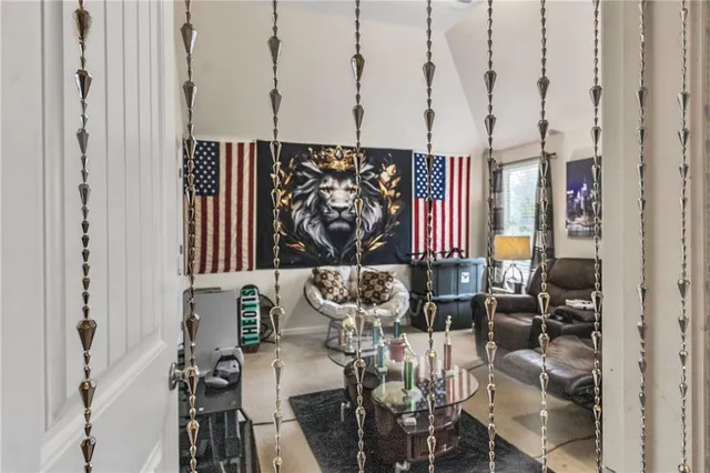 a living room with furniture and a rug