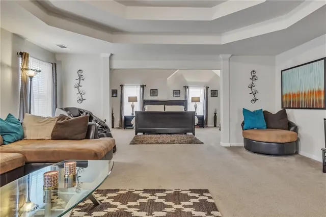 a bathroom with a shower and a sink