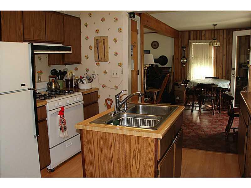 646 Newell Brook Road Durham, ME 04222 - Photo 14 of 34 Kitchen. Gas range, center sink.