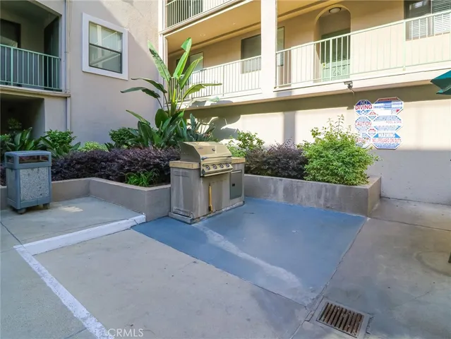 a view of a patio with table and chairs with wooden floor