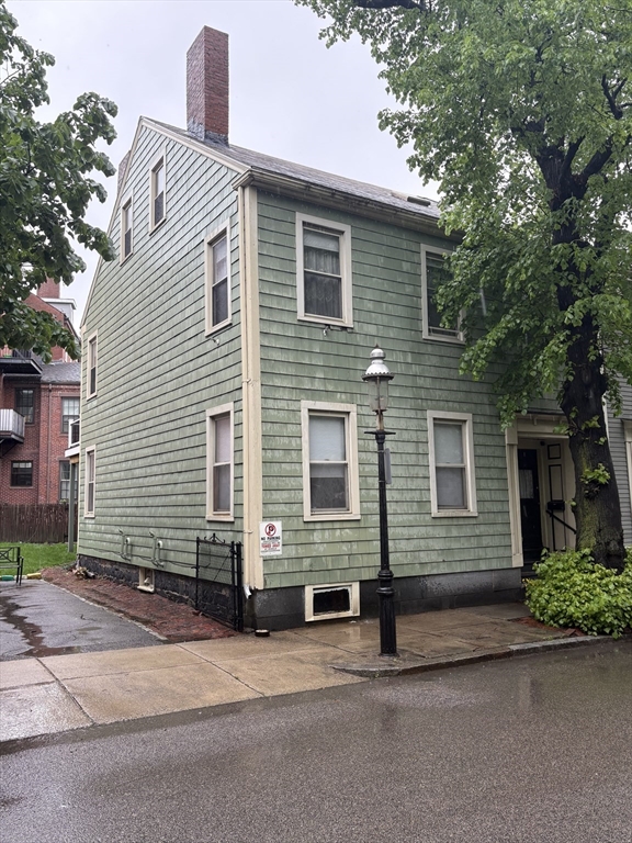 59 Washington Street Boston, MA 02129 - Photo 2 of 15 a side view of a house