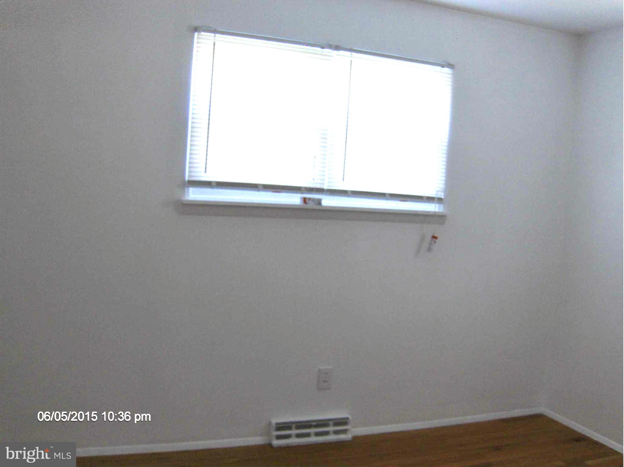 1006 Rosedale Avenue Baltimore, MD 21237 - Photo 11 of 18 a view of a small space with a window