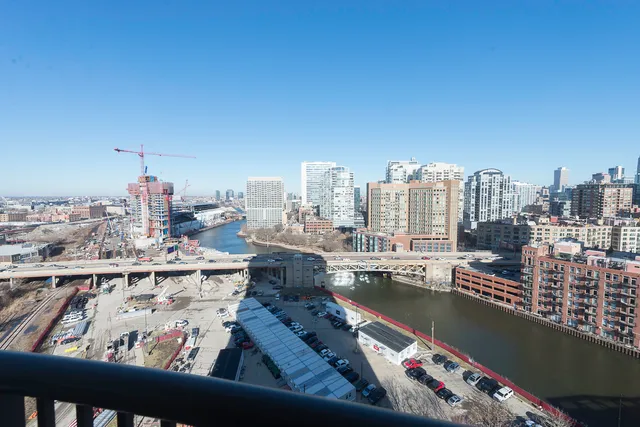 a view of a city with tall buildings