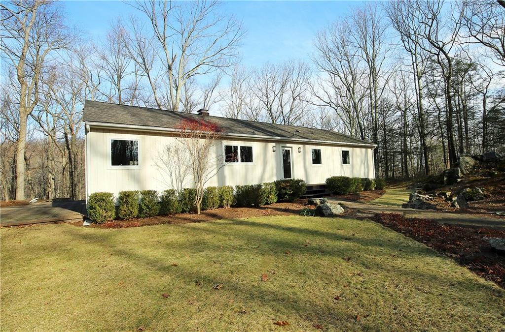 7 Glen Road Ridgefield, CT 06877 - Photo 1 of 1 a view of a house with a yard