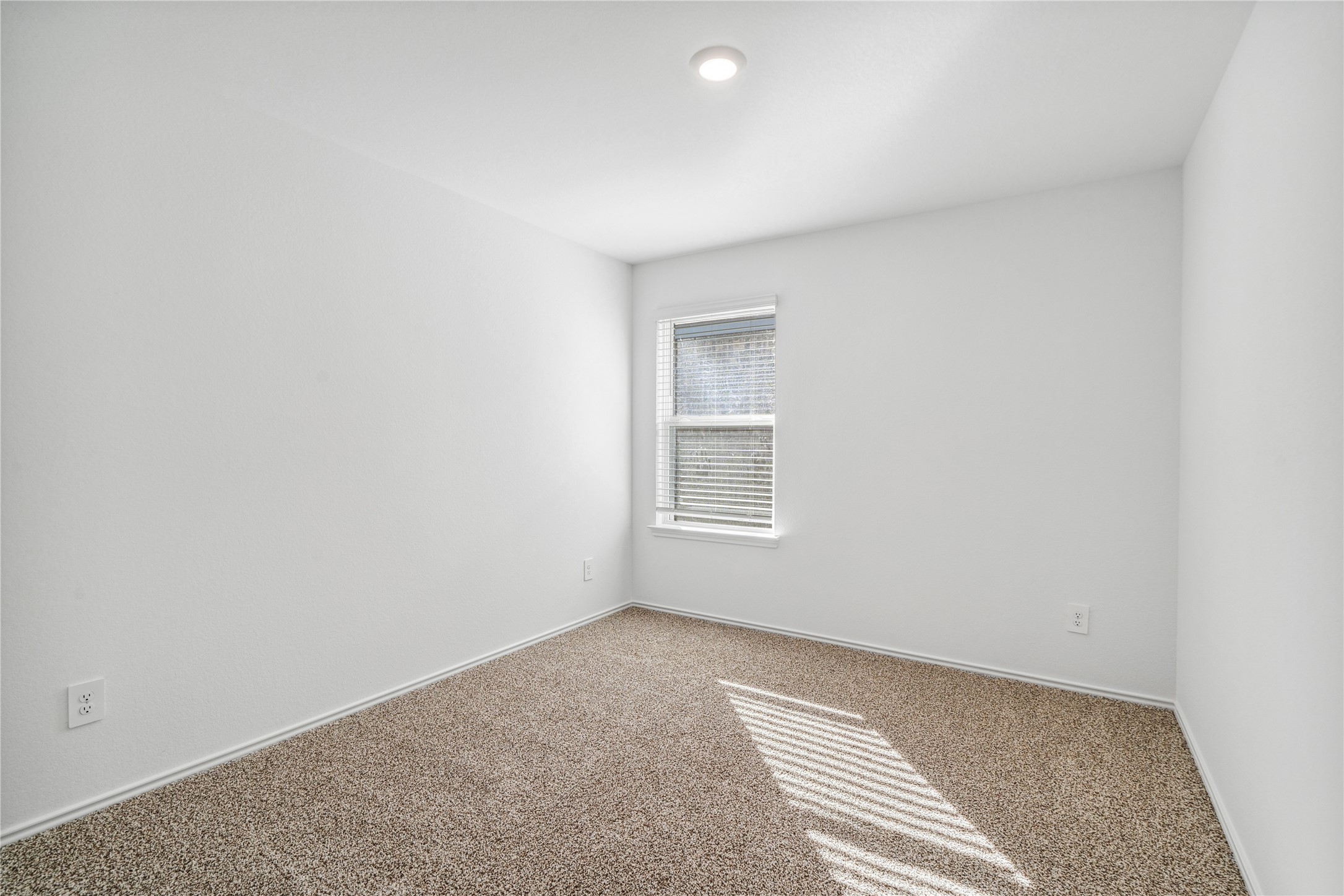 5930 Hampton Valley Dr Spring Spring, TX 77373 - Photo 24 of 35 a view of an empty room with a window