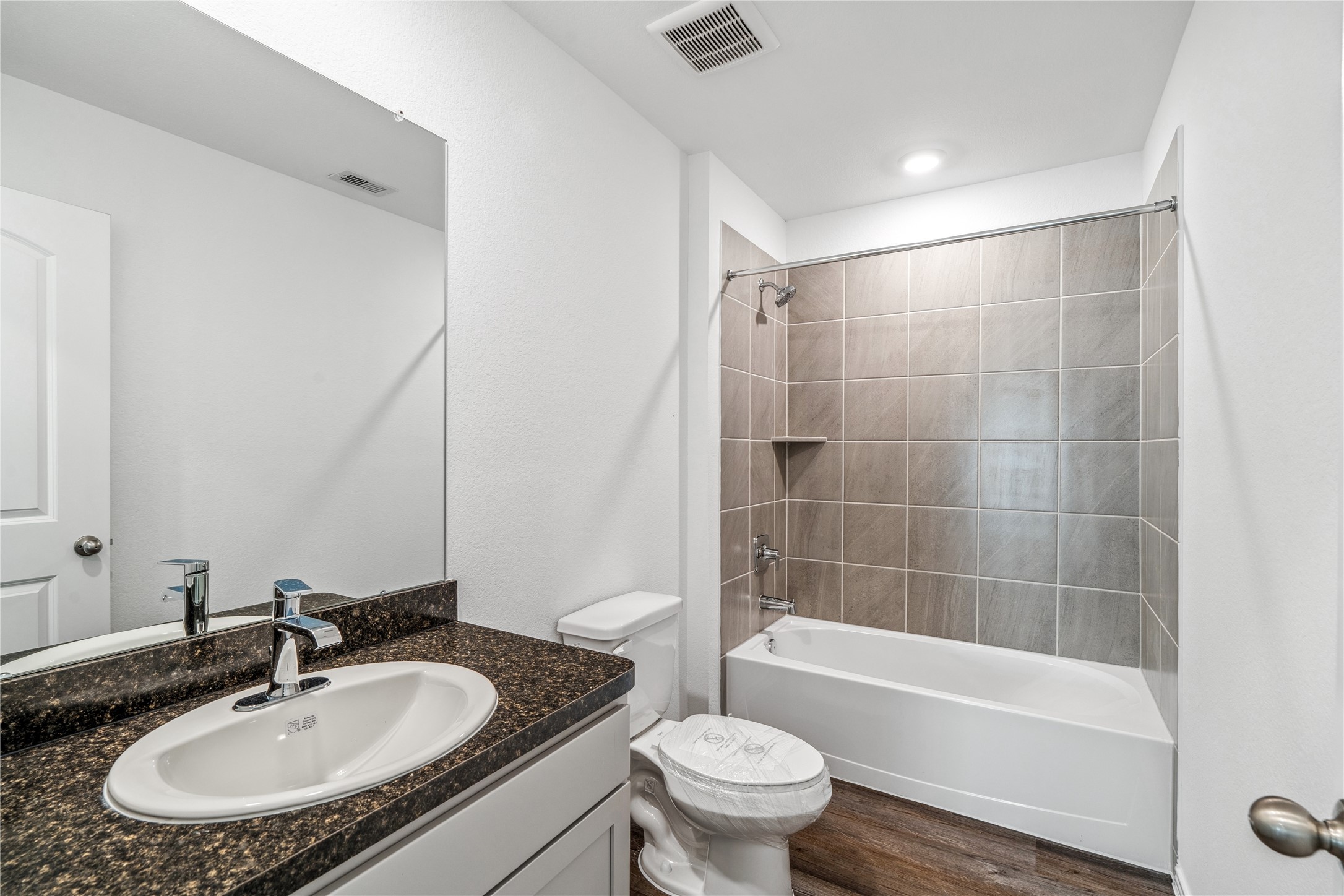 5930 Hampton Valley Dr Spring Spring, TX 77373 - Photo 26 of 35 a bathroom with a sink and a mirror