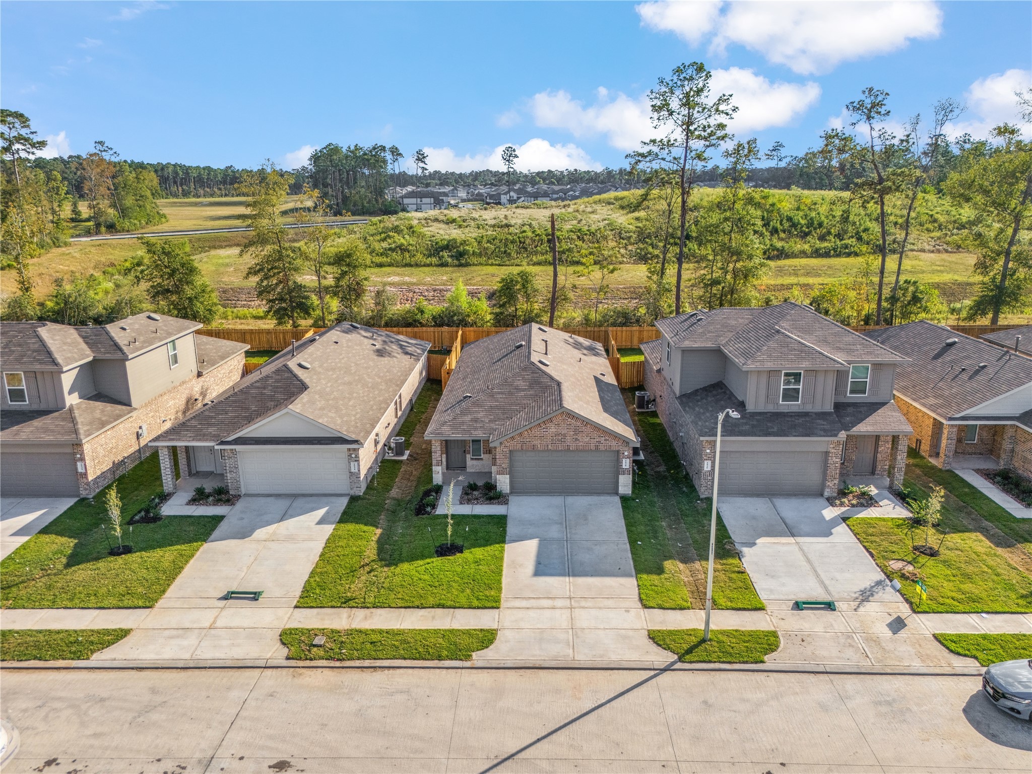 5930 Hampton Valley Dr Spring Spring, TX 77373 - Photo 3 of 35 an aerial view of residential houses with outdoor space and ocean view