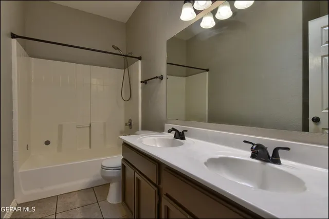 a view of a terrace with wooden floor and a potted plant