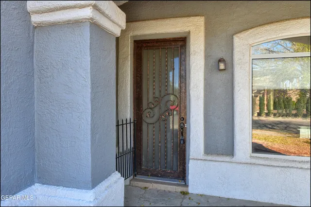 a view of a hallway view with wooden floor and staircase