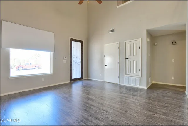 a kitchen with stainless steel appliances granite countertop a stove and a microwave