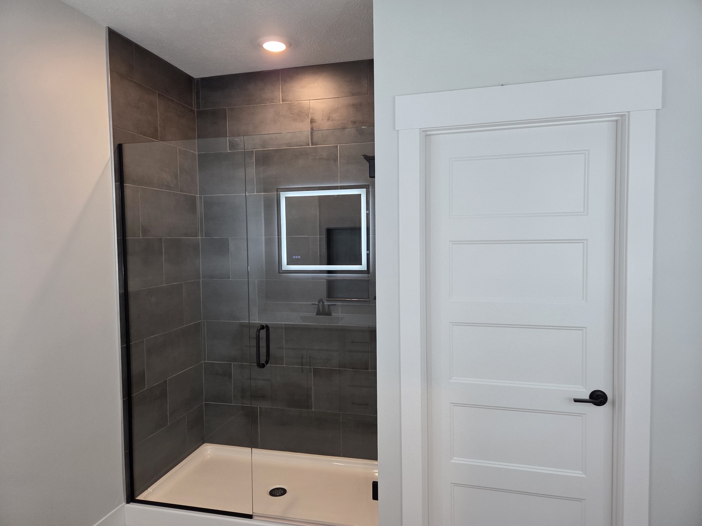 2477 Stanfield Lane Normal, IL 61761 - Photo 15 of 48 a bathroom with a shower
