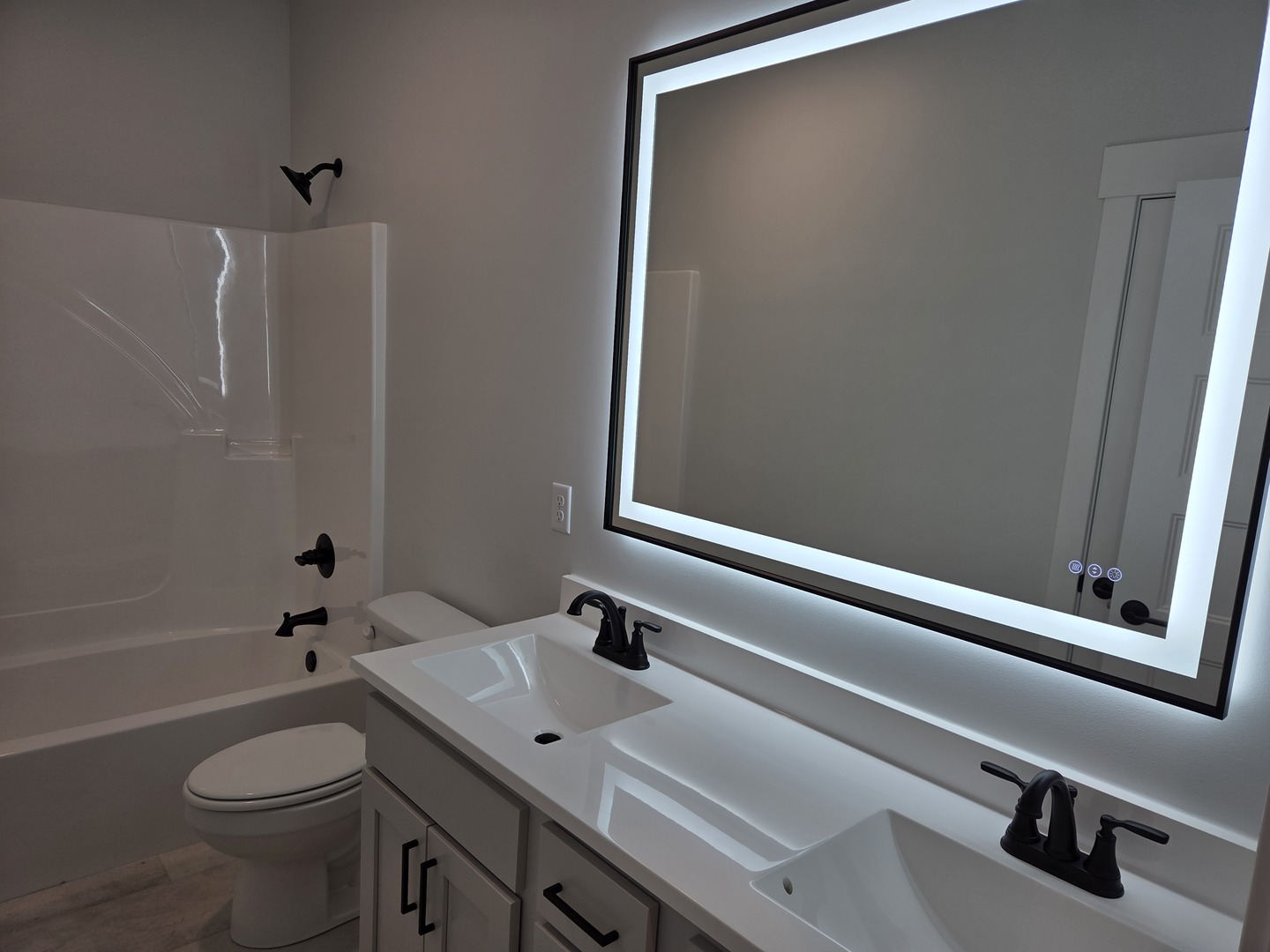 2477 Stanfield Lane Normal, IL 61761 - Photo 18 of 48 a bathroom with a sink a toilet and shower