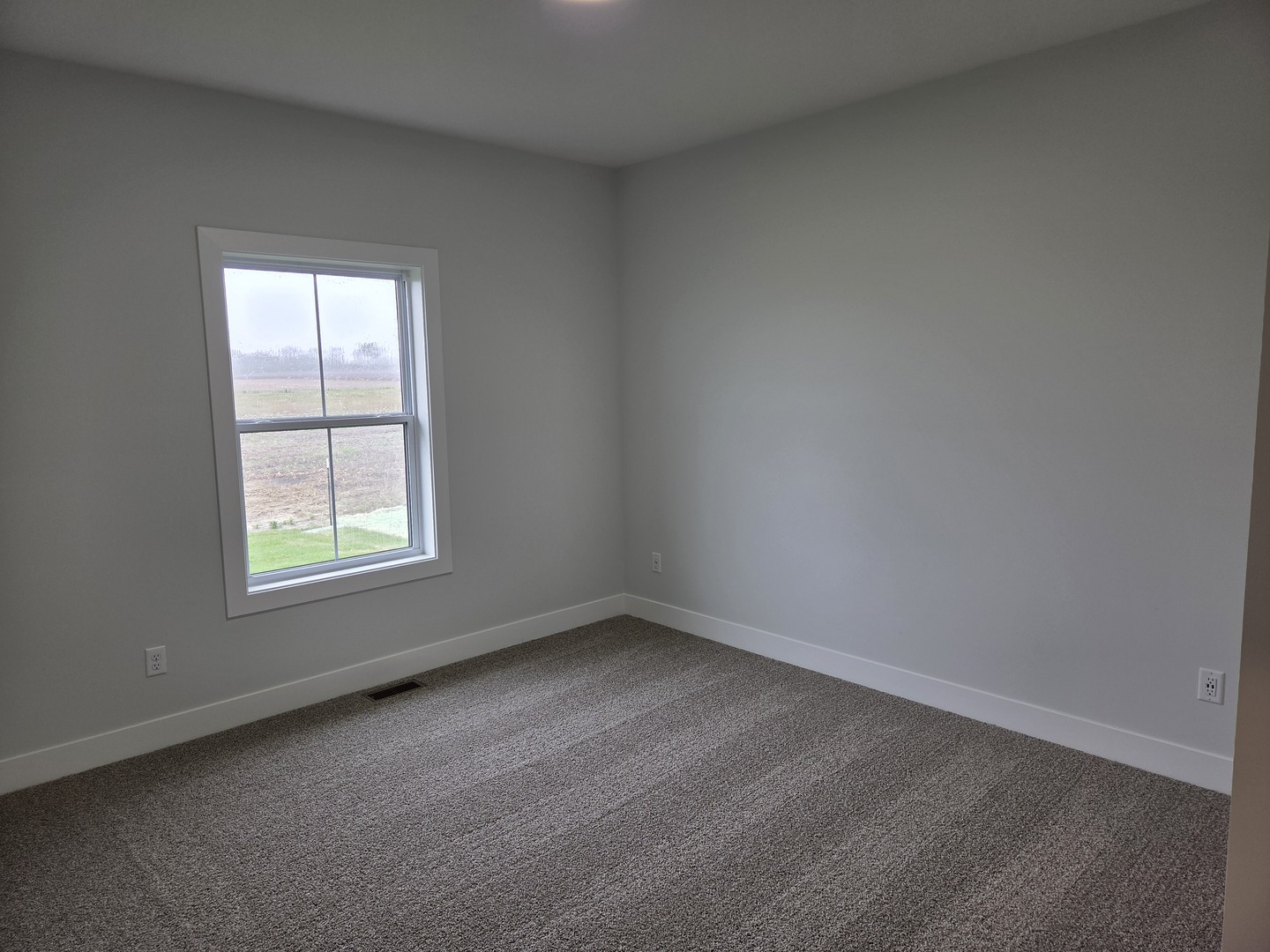 2477 Stanfield Lane Normal, IL 61761 - Photo 19 of 48 an empty room with a window