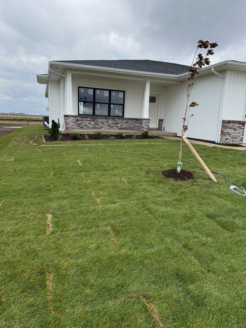 2477 Stanfield Lane Normal, IL 61761 - Photo 38 of 48 a swimming pool in front of the house