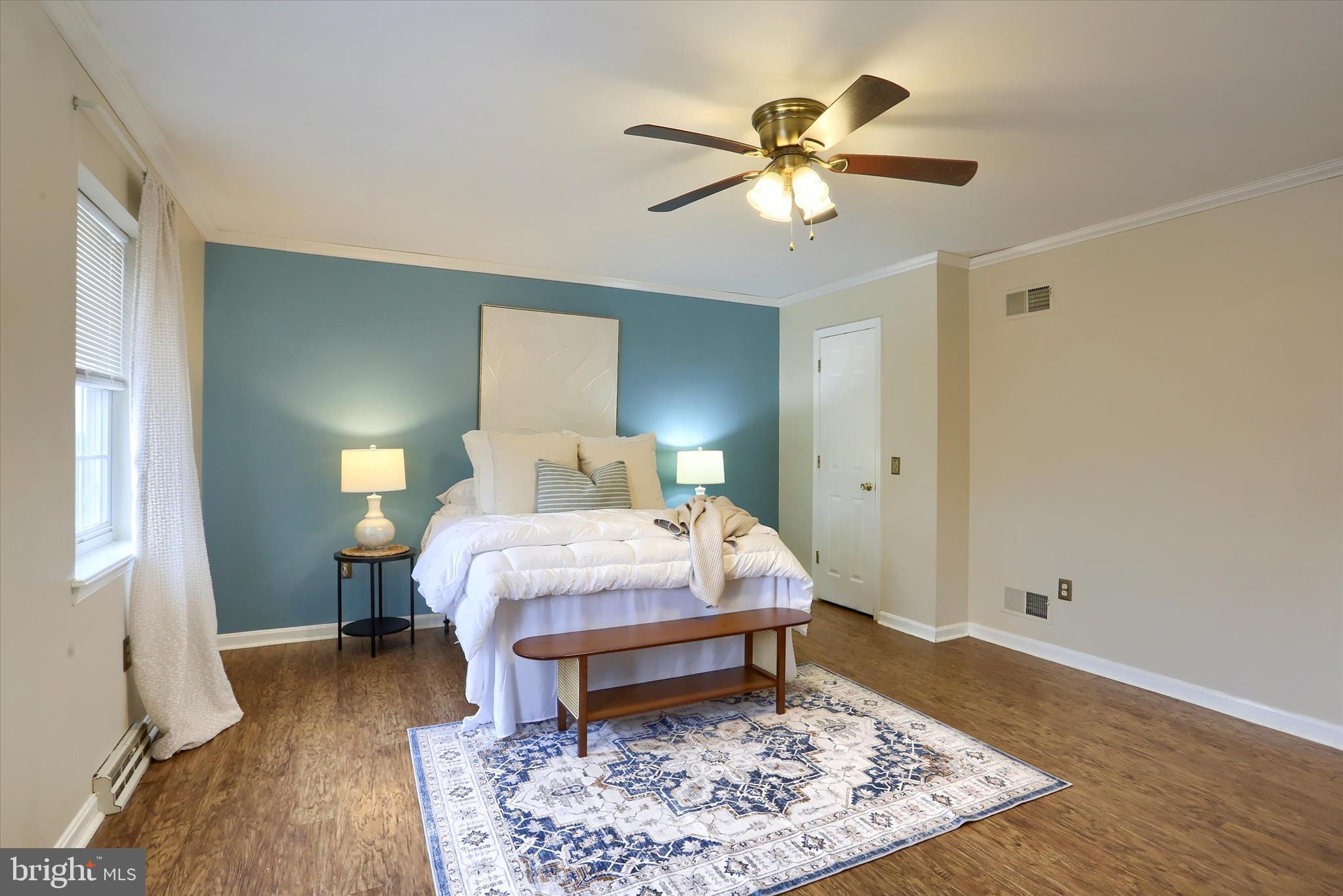 201 Overview Circle West Red Lion, PA 17356 - Photo 17 of 29 a bed room with a bed and a chandelier