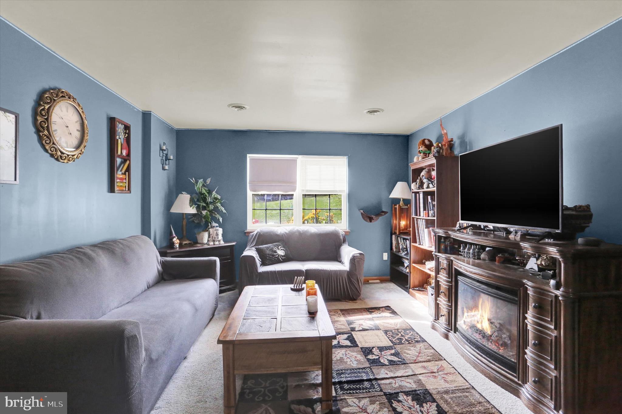 201 Overview Circle West Red Lion, PA 17356 - Photo 23 of 29 a living room with furniture and a flat screen tv