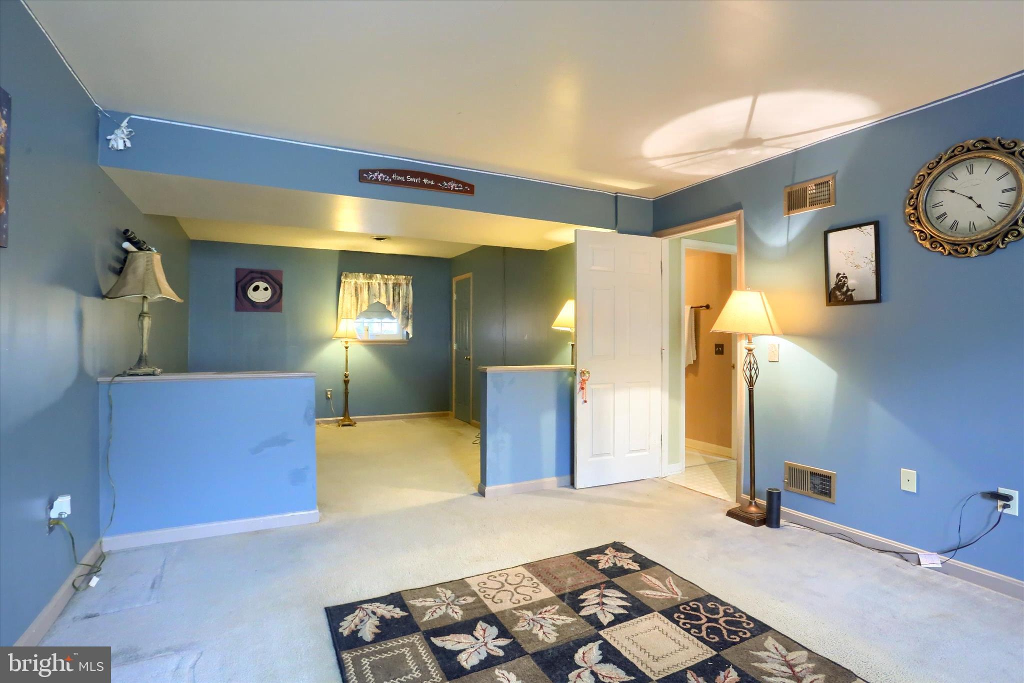 201 Overview Circle West Red Lion, PA 17356 - Photo 25 of 29 a bedroom with a bed and a mirror on the dresser