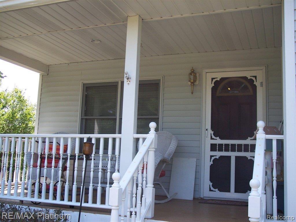 2365 Fowlerville Road Fowlerville, MI 48836 - Photo 6 of 25 CLASSIC-PORCH