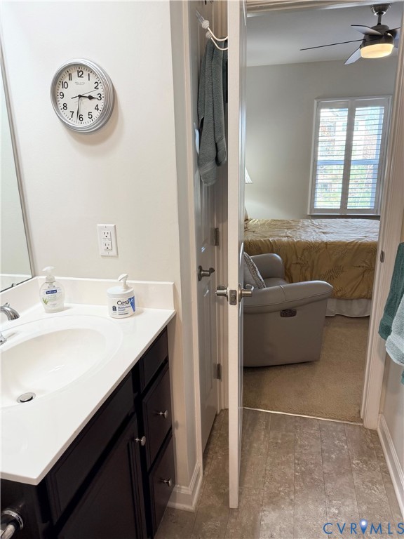 1003 Westwood Village Lane, Unit 303 Midlothian, VA 23114 - Photo 17 of 22 a en suite bathroom with a sink double vanity and a tub