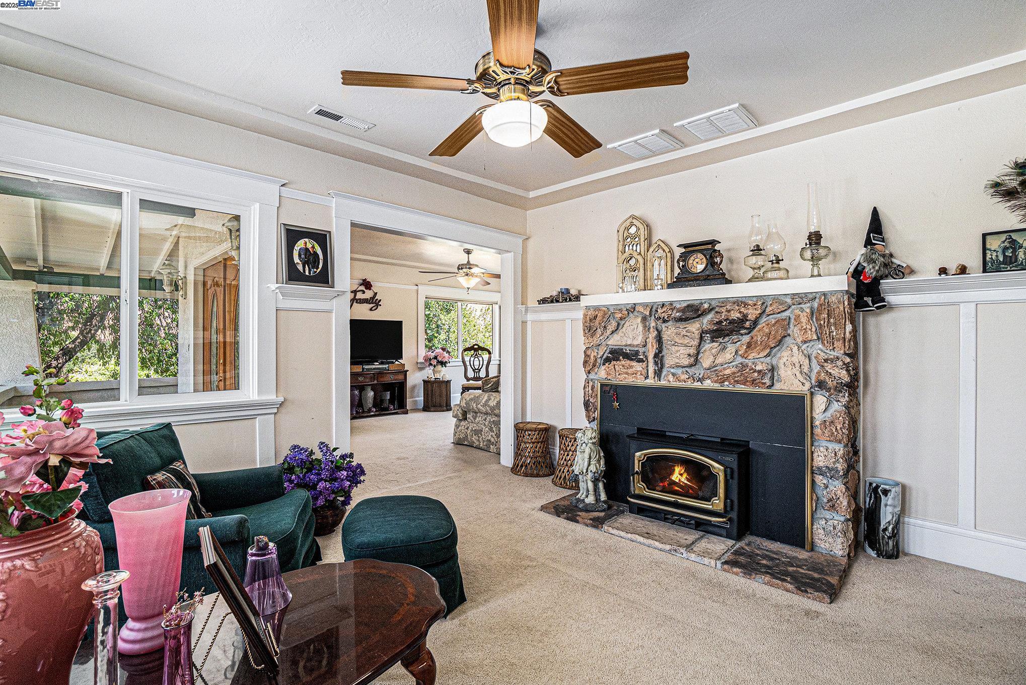 5799 Nortonville Road Pittsburg, CA 94565 - Photo 15 of 59 a living room with furniture and a fireplace