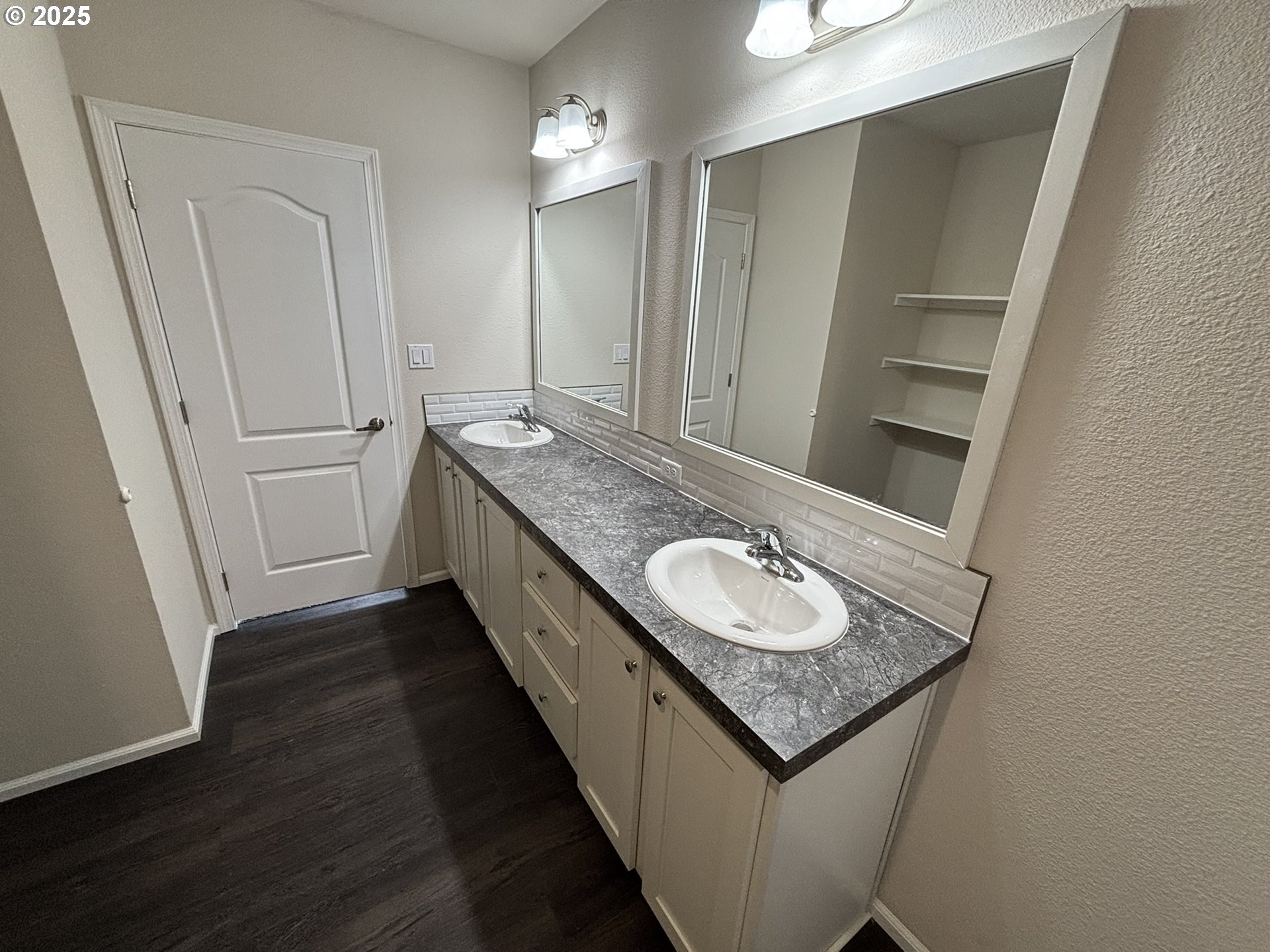 5270 Nopal Street Florence, OR 97439 - Photo 24 of 27 a bathroom with a granite countertop sink and a mirror