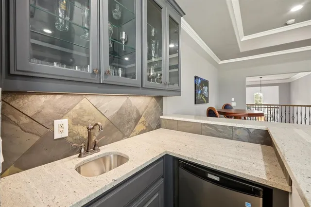 a kitchen with a sink and a window