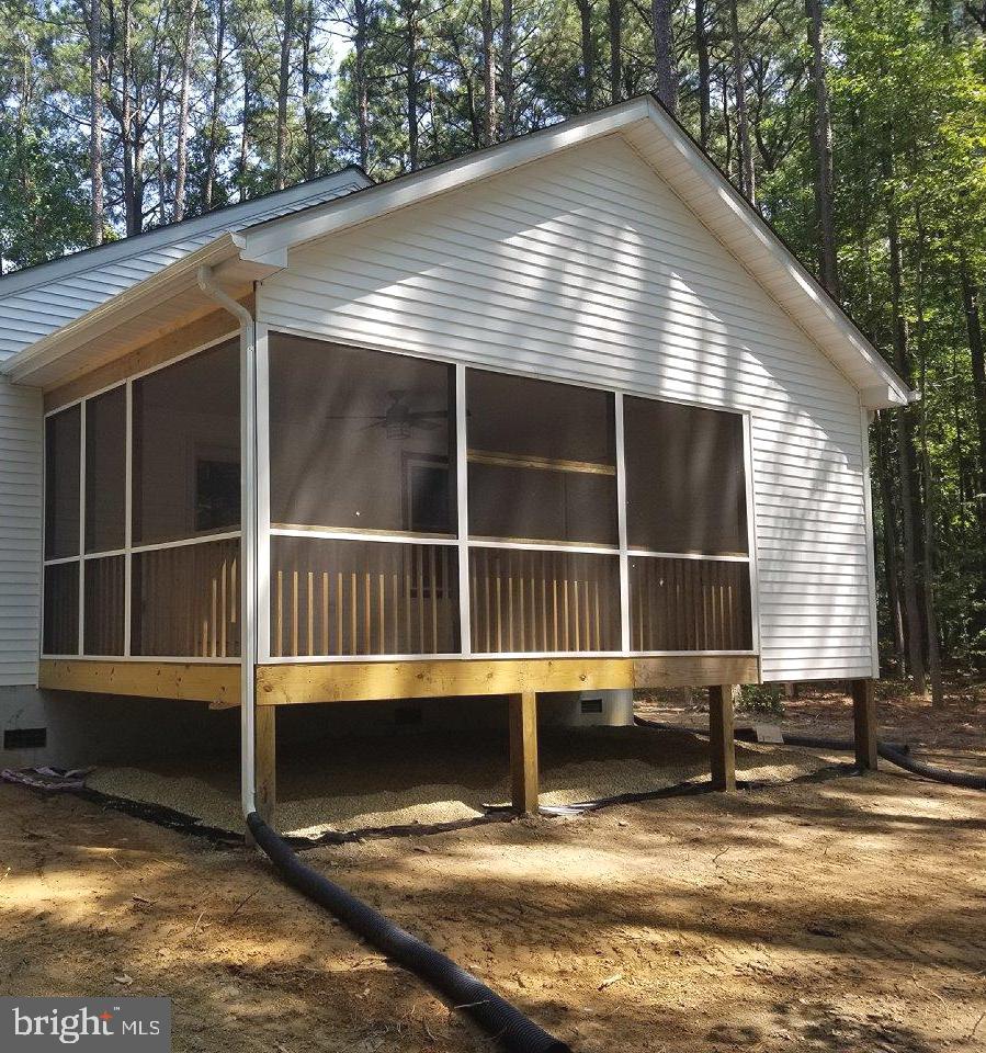 115 Cecil Road Stevensville, MD 21666 - Photo 3 of 9 Check out this screened porch at the back