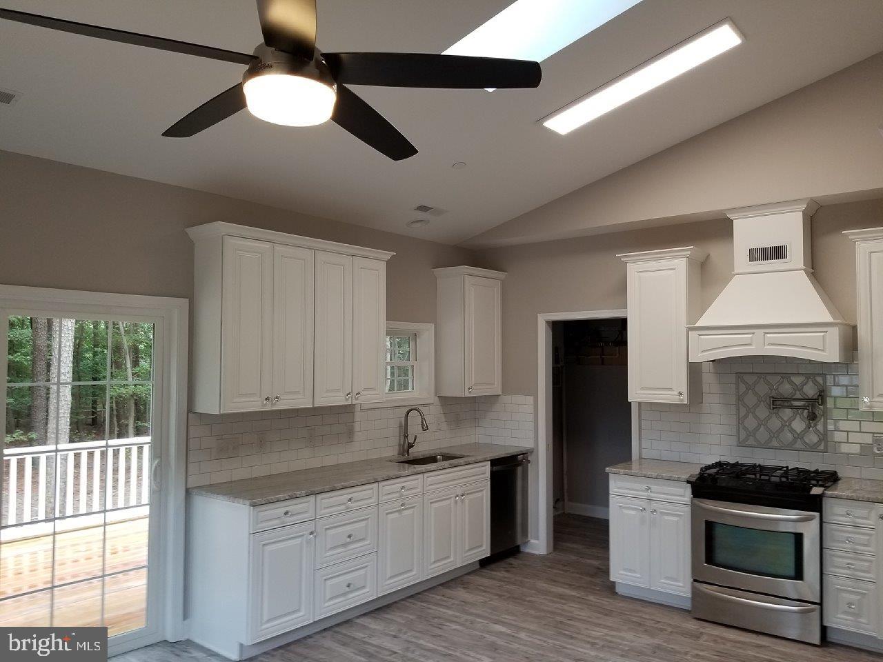 115 Cecil Road Stevensville, MD 21666 - Photo 5 of 9 Kitchen with vaulted ceiling - option for skylight