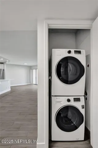 a utility room with washing machine dryer and washer