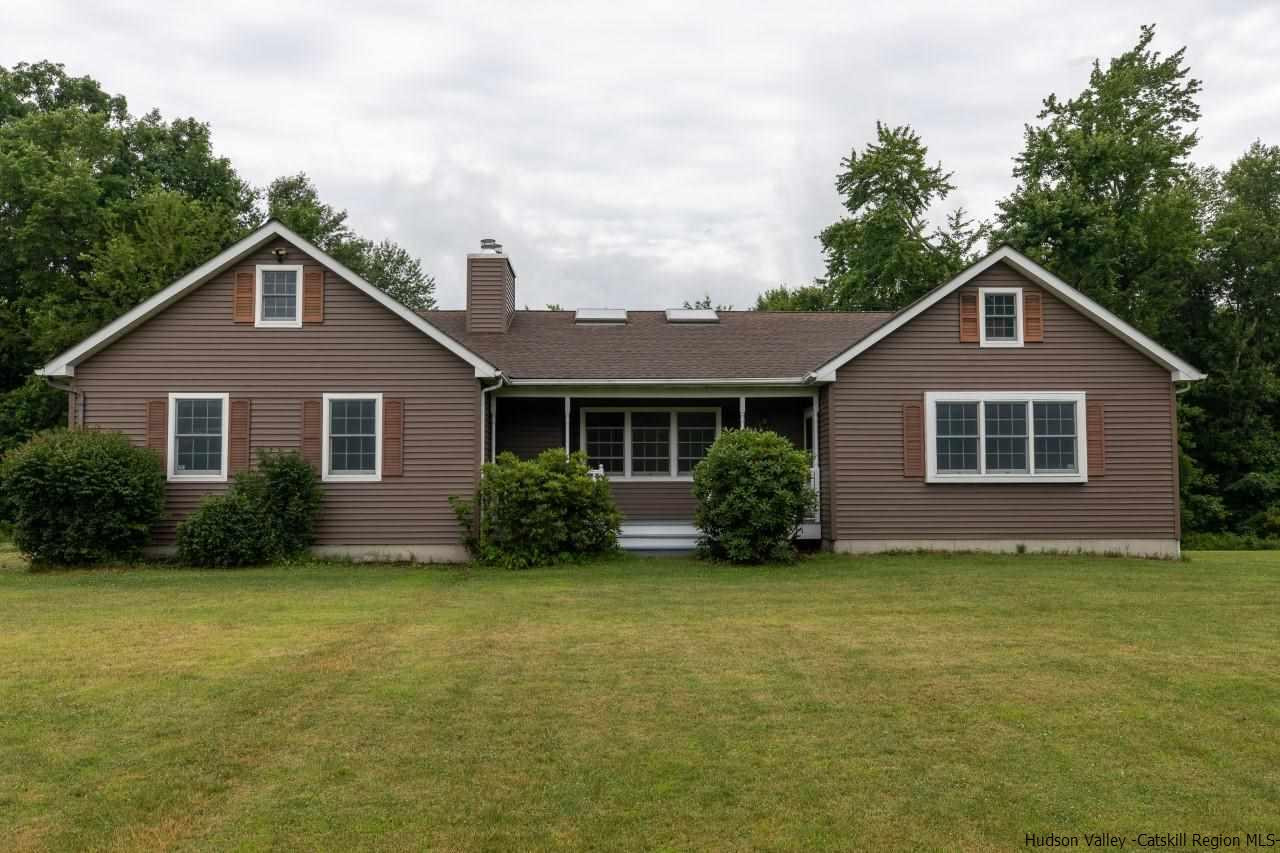 144 Burnt Meadows Road Gardiner, NY 12525 - Photo 1 of 31 a front view of a house with yard and green space