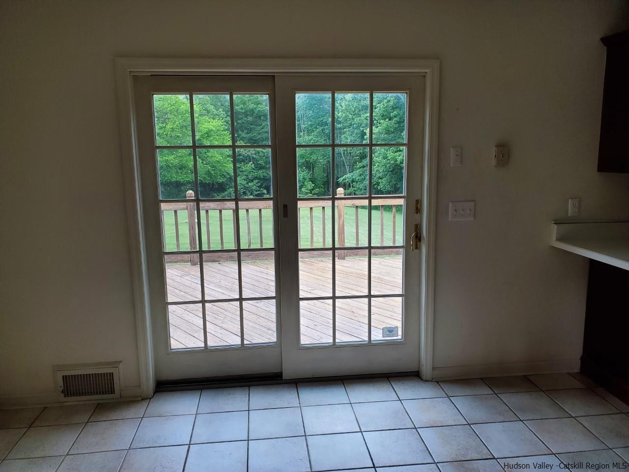 144 Burnt Meadows Road Gardiner, NY 12525 - Photo 13 of 31 a view of empty room with window and floor to ceiling window