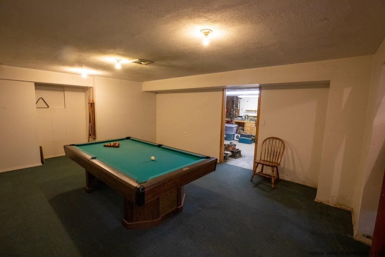 144 Burnt Meadows Road Gardiner, NY 12525 - Photo 19 of 31 a room with furniture and screen pool