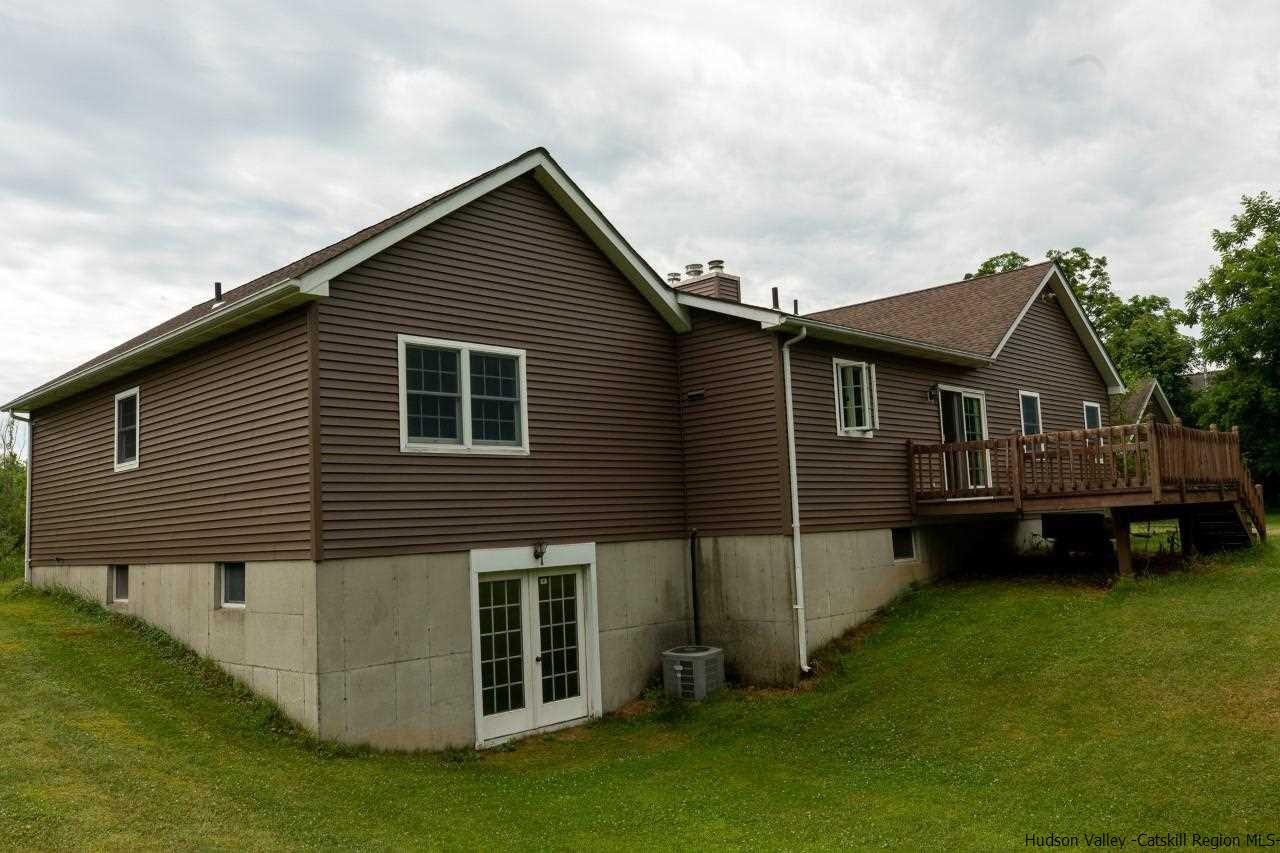 144 Burnt Meadows Road Gardiner, NY 12525 - Photo 27 of 31 a front view of a house with a garden