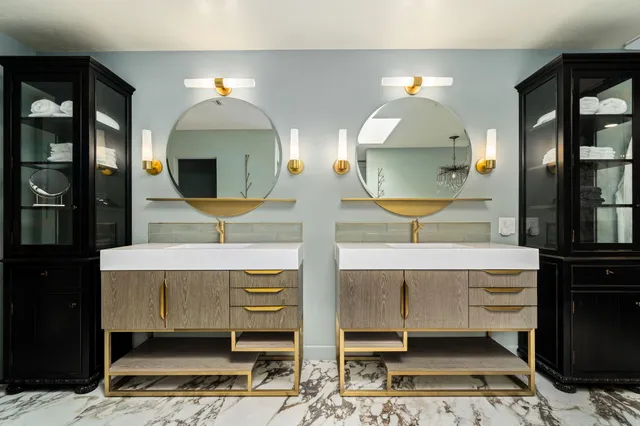 a view of living room with furniture and lamp