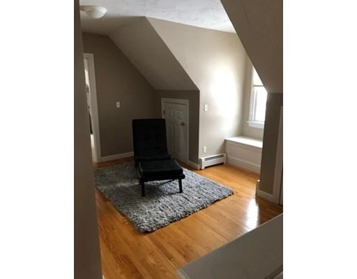 24 Birch Brush Road Shrewsbury, MA 01545 - Photo 13 of 27 a living room with a sink and a mirror