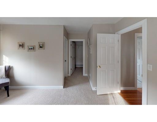 24 Birch Brush Road Shrewsbury, MA 01545 - Photo 15 of 27 a living room with furniture and a lamp