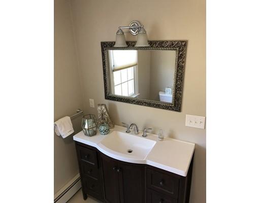 24 Birch Brush Road Shrewsbury, MA 01545 - Photo 16 of 27 a bathroom with a sink vanity and a mirror