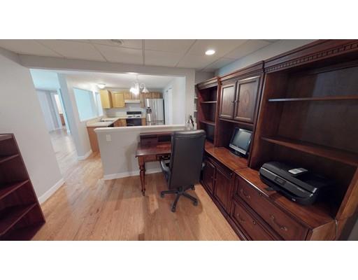 24 Birch Brush Road Shrewsbury, MA 01545 - Photo 19 of 27 a kitchen with a sink dining table and chairs