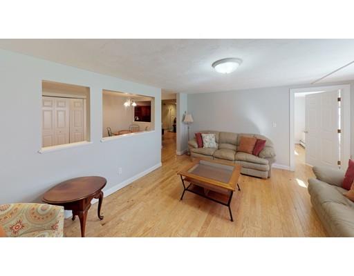 24 Birch Brush Road Shrewsbury, MA 01545 - Photo 21 of 27 a living room with furniture and a wooden floor